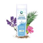 a bottle of shower gel with flowers and leaves